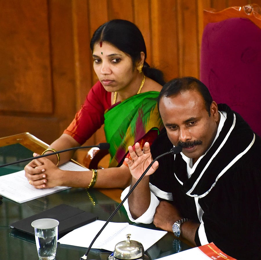  Mayor Sampath Raj speaks at the BBMP council meeting on Thursday, Deputy mayor G Padmavathi looks on. dh  Photo