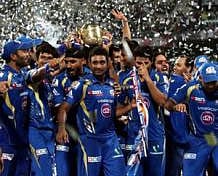Kolkata: Mumbai Indians celebrate with winners trophy after final of the IPL 6 in Kolkata on Sunday. PTI Photo by Ashok Bhaumik