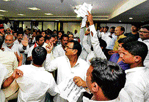 BJP supporters demonstrate demanding ticket for their candidate in Hyderabad on Monday. PTI