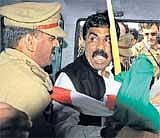 Attempt Foiled: Police arrest Lagadapati Rajagopal, Congress MP from Vijayawada, who was preparing to begin a hunger strike against the creation of Telangana, in Hyderabad on Monday. Rajagopal was freed later. Most trains and buses started running again in Andhra Pradesh and shops and schools reopened on Monday. AP