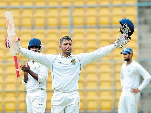 IN FINE TOUCH Abhishek Reddy (centre) of KSCA XI celebrates after reaching his century against Vidarbha at the M Chinnaswamy Stadium in Bengaluru on Sunday. DH PHOTO