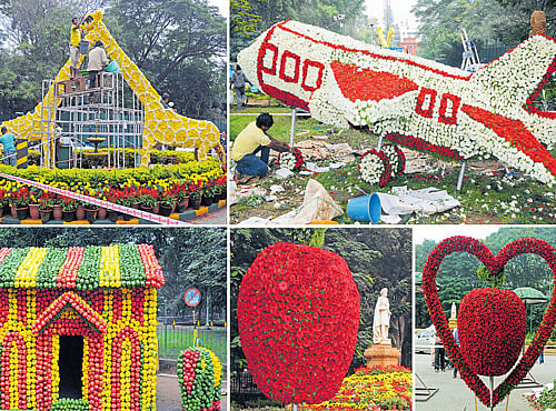 EYE CATCHERS: The floral replicas of a giraffe, aeroplane and a hut made of capsicum are among the attractions at the two-day flower show organised to mark Children's Day, at the Cubbon Park. DH PHOTO