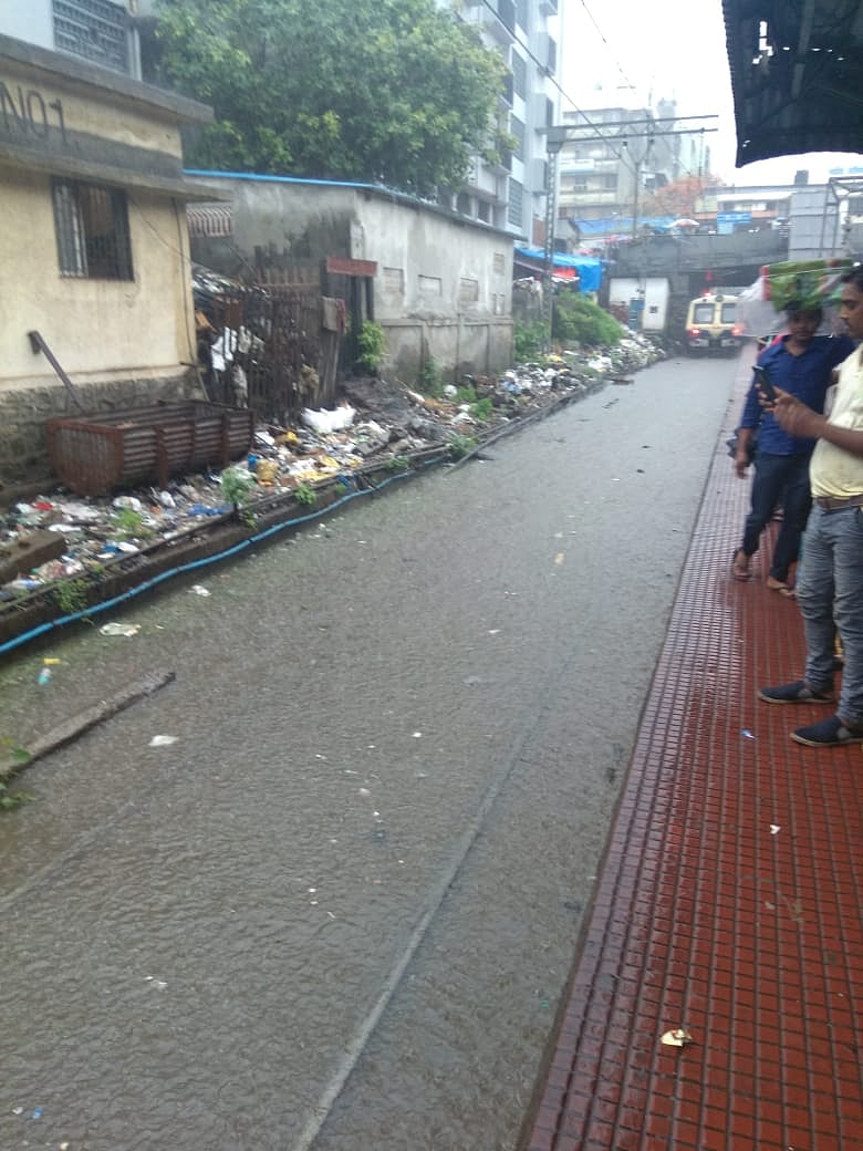 A view of the waterlogged line on the Central Railway's suburban services, in Mumbai on Saturday.