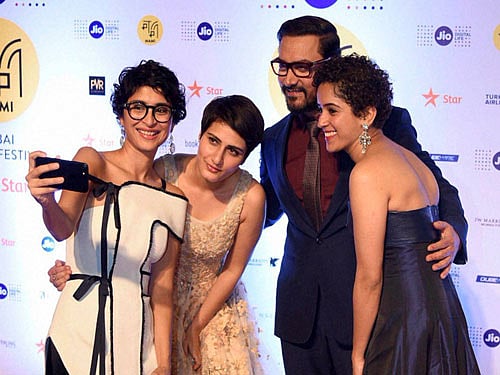 Kiran Rao and Amir Khan at the opening ceremony of MAMI Film Festival 2016 in Mumbai on Thursday. PTI Photo
