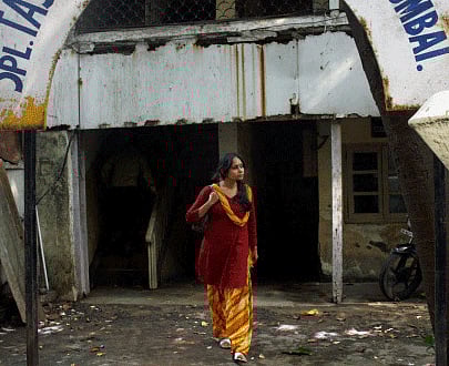 Wife of former NSEL chief executive officer and managing director, Anjani Sinha, appears before the Economic Offences Wing (EOW) of the Mumbai police, in Mumbai on Wednesday. PTI Photo