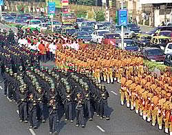 Police officers march in a parade marking the first anniversary of the terror attack in Mumbai on Thursday. AFP