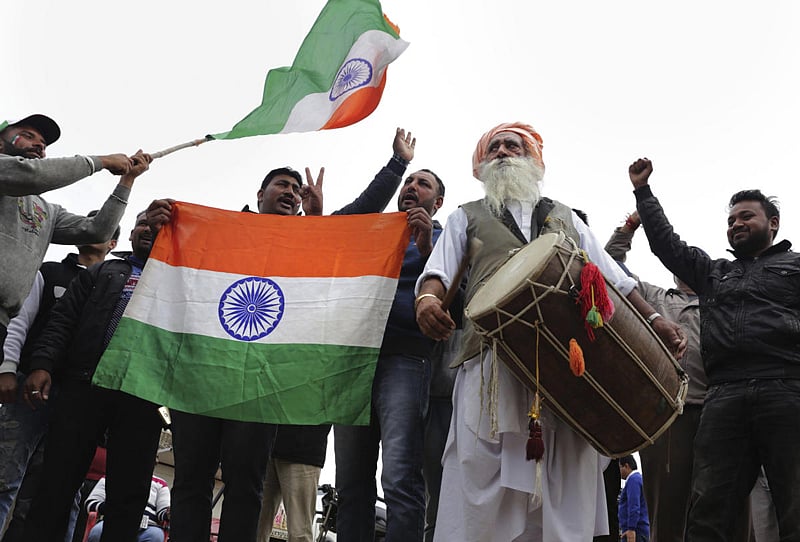 People celebrate ahead of Abhinandan Varthaman's return to India. PTI photo.