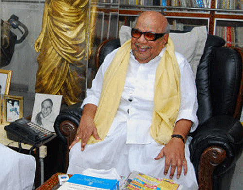DMK president M.Karunanidhi Sunday declared that the party will not align with Congress or BJP to fight the 2014 general elections. PTI File Photo