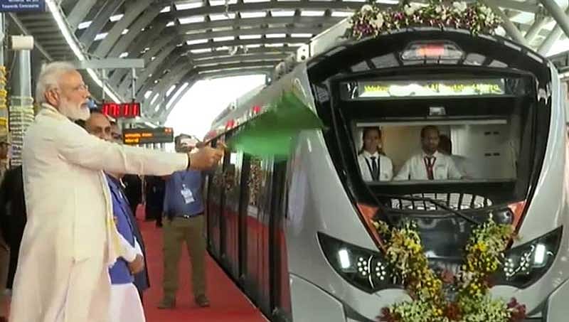 Prime Minister Narendra Modi flags off Metro train in Ahmedabad on Monday. (AIR/Twitter)