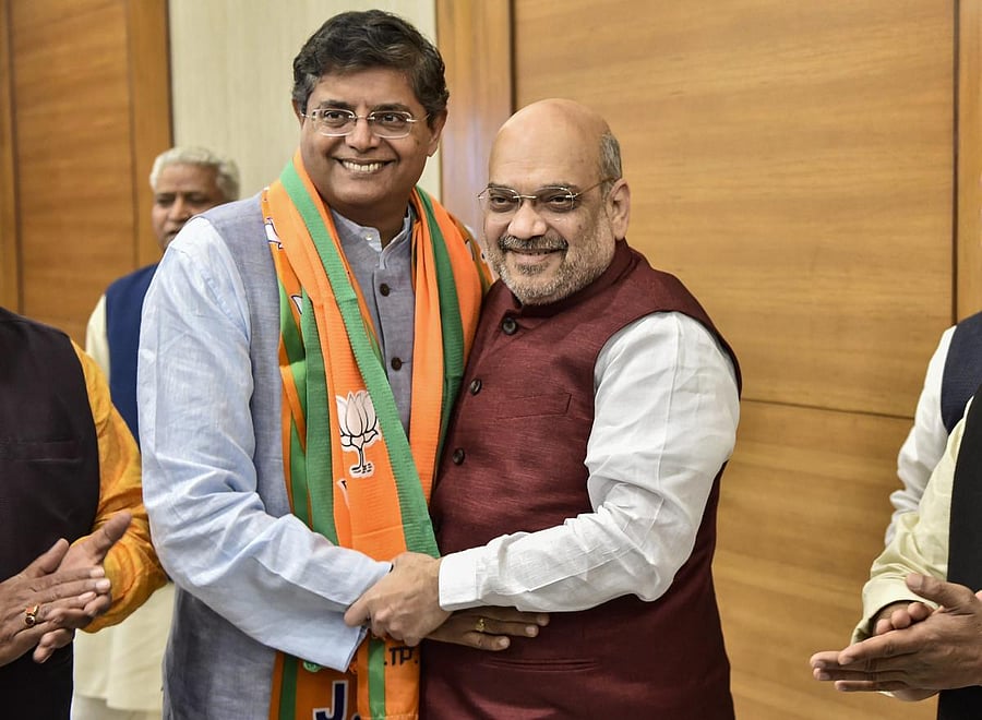Former Biju Janata Dal MP Baijayant Jay Panda greets BJP national president Amit Shah after joining the saffron party, in New Delhi, on Monday. PTI
