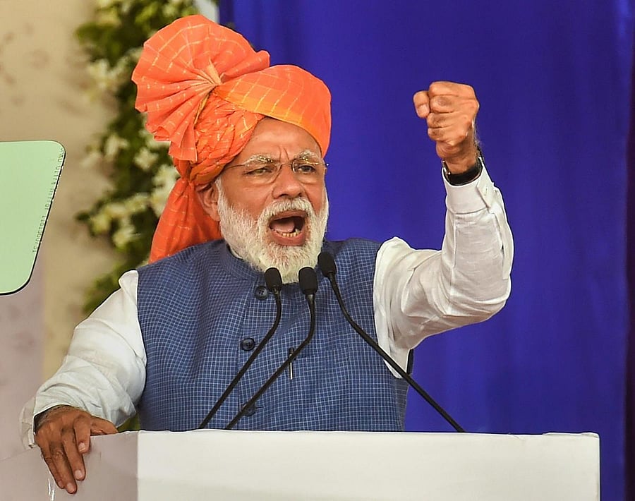 Prime Minister Narendra Modi during the launch of 'Pradhan Mantri Shram Yogi Pension Yojana' (PM-SYM Scheme 2019) for unorganised workers, in Ahmedabad. PTI