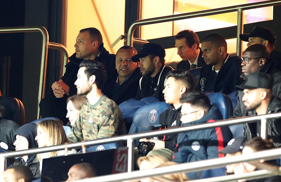 Paris St Germain's Neymar sat alongside Neymar Santos Sr in the stands during the match. (REUTERS)