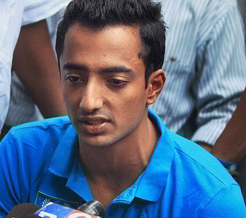 ricketer Ankeet Chavan talks to media outside his residence in Mumbai. File PTI Image