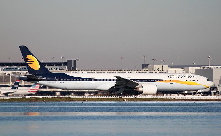 FILE PHOTO: A Jet Airways Boeing 777-300ER taxis at San Francisco International Airport, San Francisco, California, February 16, 2015. REUTERS/Louis Nastro/File Photo
