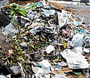 Rain adds to mess as garbage crisis mounts in City