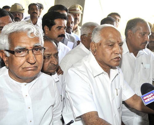 Former Chief Minister and KJP President BS Yeddyurappa, Minister CM Udasi and a few MLAs come out of Speaker KG Bopaiah's chamber at Vidhana Soudha in Bangalore on Wednesday. DH Photo by BK Janardhan
