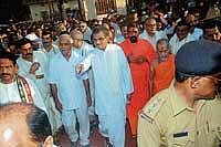 Chief Minister B S Yeddyurappa and Dharmastala Dharmadhikari D Veerendra Heggade, Pejawar seer Vishwesha Theertha Swamiji and other dignitories arrive at the World Tulu convention venue on Thursday. . DH photo