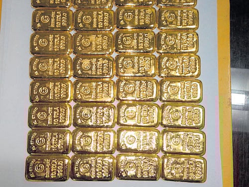 The gold biscuits seized from a woman at the Kempegowda International Airport in the City on Sunday. DH photo