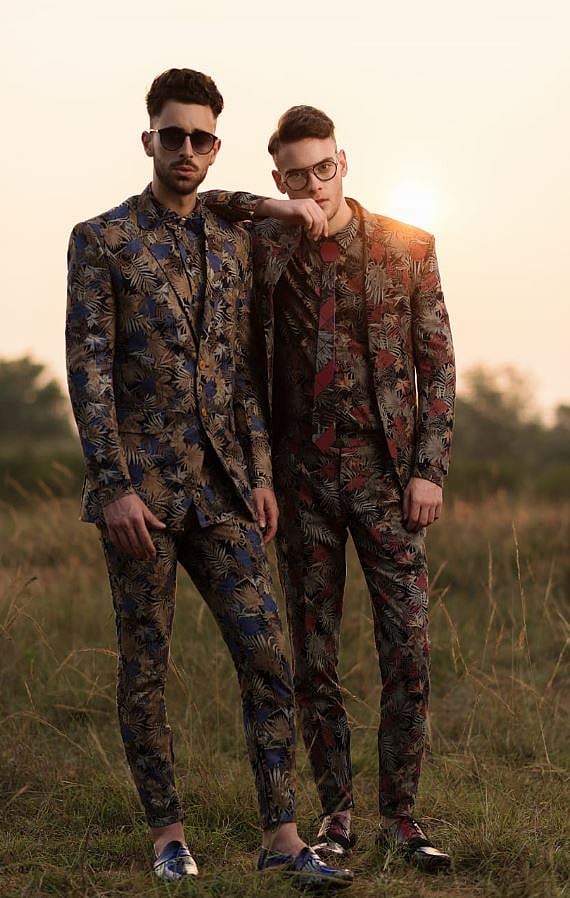 Models wearing Bharat Sagar's floral suits.