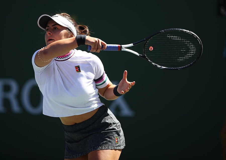 FIERCE: Bianca Andreescu of Canada returns during her quarterfinal win over Garbine Muguruza of Spain. AFP