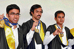 Shining bright: Toppers Abhinav Rao, Phalguna P, Shantanu Chakraborty and Umesh C S display their gold medals at the 12th annual convocation of the Visvesvaraya Technological  University in Belgaum on Friday. dh photo