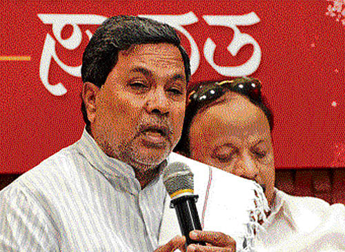 Chief Minister Siddaramaiah addresses a press conference at the Bangalore Press Club on Friday. dh photo