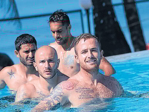 doing it the bfc way! Bengaluru FC's Joshua Walker (front), Sean Rooney (second from right), Darren Caldeira (second from left) and Robin Singh enjoy their time in the pool on Saturday ahead of their Federation Cup final against Dempo SC in Vasco on Sunday. BFC