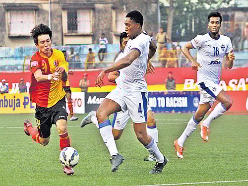 strong challenge Bengaluru FC's Curtis Osano (right) attempts to thwart Do Dong-Hyun of East Bengal during their I-League clash on Saturday. bfc media