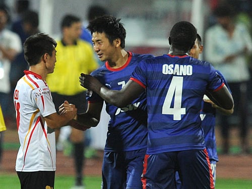 Kim Song Yong(center) Player of BFC Celebrate the victory against Kingfisher East Bengal during the football I league at Sri Kanteerava stadium in Bengaure on Sunday. DH Photo