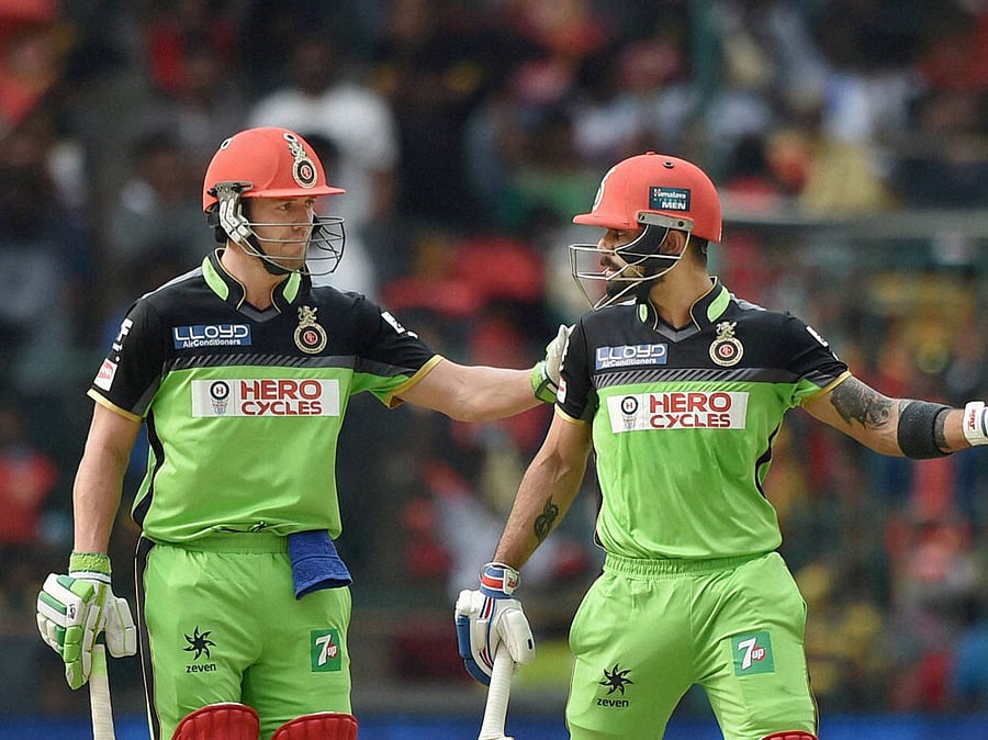 AB de Villiers blasted his way to his second IPL century (129 n.o., 52b, 10x4, 12x6) while Virat Kohli stroked his way to his third century (109, 55b, 5x4, 8x6) of the season as the Royal Challengers buried Lions in an avalanche of runs here at the Chinnaswamy stadium on Saturday. DH Photo