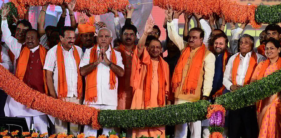 BJP leaders K S Eshwarappa, D V Sadananda Gowda, B S Yeddyurappa, R Ashoka, Uttar Pradesh Chief Minister Yogi Adityanath, Union Ministers Ananth Kumar, Prakash Javadekar, party leaders V Somanna and Shobha Karandlaje at a rally organised in Bengaluru on Sunday. dh photo