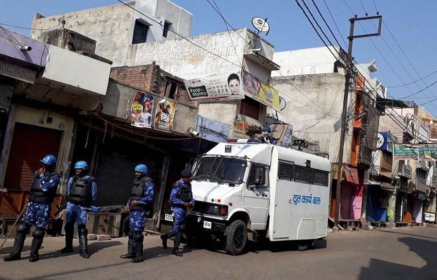 More than 80 persons were arrested while Rapid Action Force (RAF) and Provincial Armed Constabulary (PAC) personnel intensified vigil in Kasganj on Sunday. PTI Photo