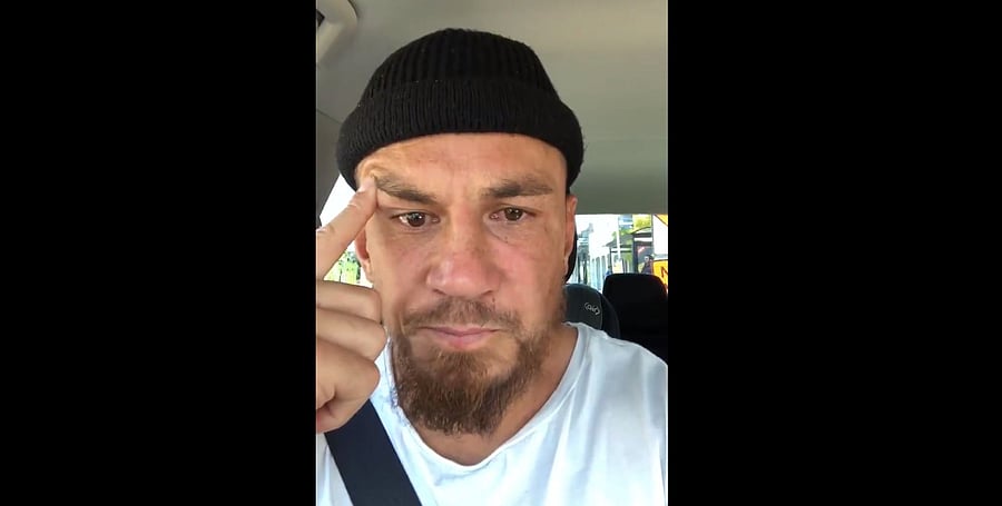 The devout Muslim, wearing a skull cap, wiped away tears several times in the brief footage which he filmed sitting in a car. (Screengrab)