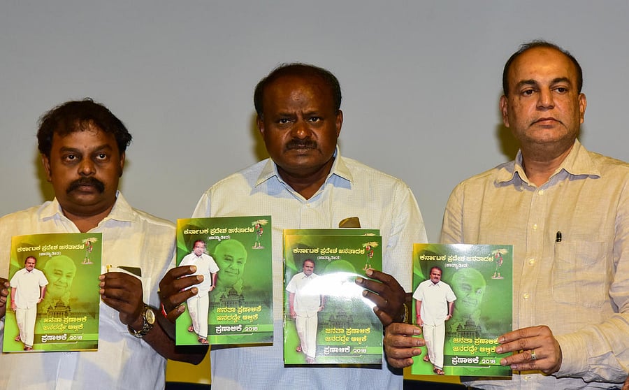JDs State President H D Kumar Swamy releasing the JDs Party Manifesto, at J P Bhavan in Bengaluru on Monday 7th May 2018. Jds Leader T A Sharavana, B M Farooq, Kupendra Reddy Ramesh Babu and others are also seen. Photo/; B H Shivakumar