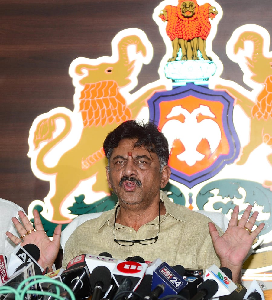Water Resources and Medical Education Minister D K Shivakumar addresses a press meet at his residence inBengaluru on Wednesday. DH PHOTO