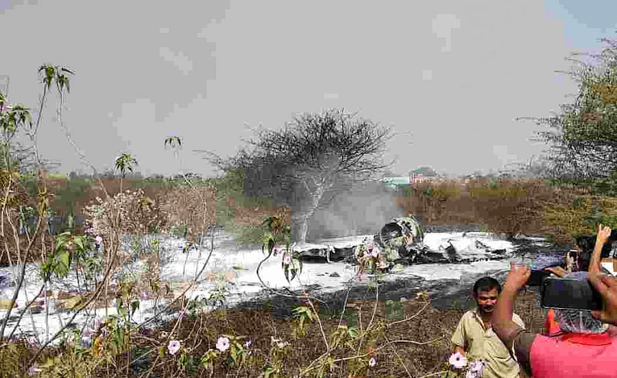 The wreckage of the Mirage 2000 fighter aircraft on HAL Airport runway soon after take-off in Bengaluru on Friday.