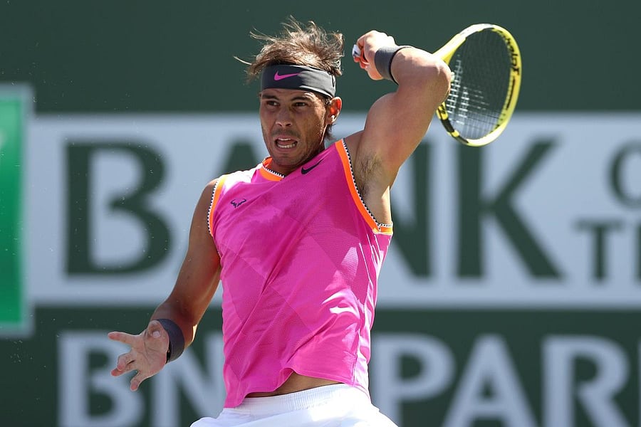BATTLING WIN: Rafael Nadal of Spain returns during his quarterfinal win over Karen Khachanov of Russia. AFP