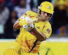 Raining Runs:  Chennai Super Kings Suresh Raina hammers one to the fence during his knock of 94 not out against Royal Challengers Bangalore in the semifinal in Durban on Friday. AFP