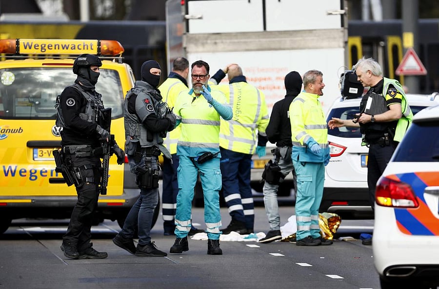 Police forces and emergency services stand at the 24 Oktoberplace in Utrecht, on March 18, 2019 where a shooting took place. AFP/ANP