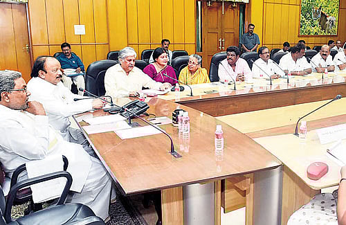 Chief Minister Siddaramaiah,  Information Minister Roshan Baig, Karnataka  Chalanachitra Academy chairperson S V Rajendra Singh Babu and others at the  meeting with multiplex owners in Bengaluru on Thursday. DH&#8200;Photo