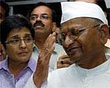 Social activist Anna Hazare and Kiran Bedi . PTI File Photo