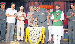 General Officer Commanding (Karnataka and Kerala Sub-Area) Major General K S Venugopal inaugurating district-level convention of ex- servicemen, at Kuvempu Kalamandira in Chikmagalur on Sunday. MP Jayaprakash Hegde, Higher Education Minister C T Ravi, CMC President C R Prem Kumar look on.