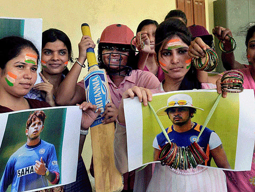 Women cricketers of Magadh Mahila college are shouting slogans during a protest against spot fixing of IPL matches in Patna on Friday. PTI Photo