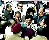 A TV grab shows commotion in Rajya Sabha after Home Minister P Chidambaram tabled the Liberhan Commission of Inquiry report in New Delhi on Tuesday. PTI / Courtesy India TV