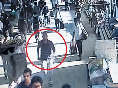 The Tamil Nadu Police is on the lookout for the bald man caught on camera running away from the train minutes before two bombs went off in two coaches of the Bangalore-Guwahati Express Thursday, an official said Saturday. CCTV grab