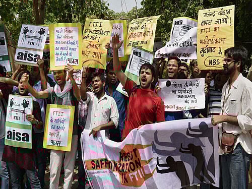 Students protest against the appointment of Gajendra Chauhan as the chairman of the FTII governing council, in New Delhi on Friday. PTI Photo.