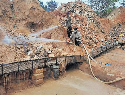 The illegal sand filtering unit that was being run on  BBMP property just off Nice Road. DH Photo