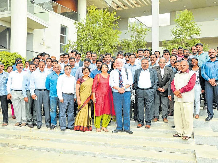 James Manor, professor emeritus, University of London, seen with students and staff of MYRA School of Business, in Mysuru, recently.