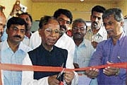 District In-Charge Minister Mumtaz Ali Khan inaugurating the Pradhan Mantri Gram Sadak Yojana office in Chikkaballapur on Wednesday.