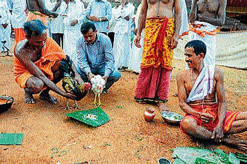 Marati community members performing 'gondholu pooja,' a main ritual of the community. File photo
